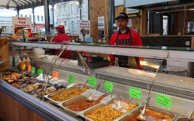 Trader behind stall
