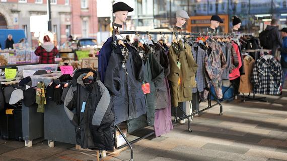 Row of jackets at clothes stall