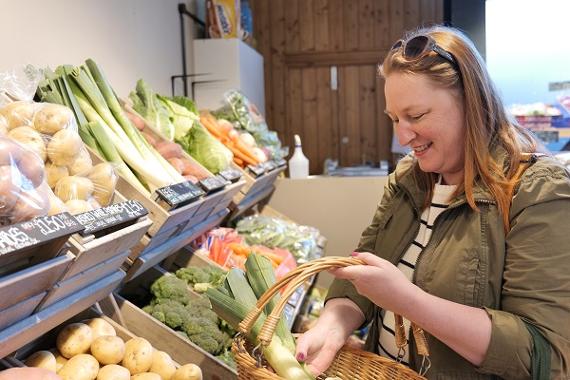 Customer shopping at Fresh and Fruity