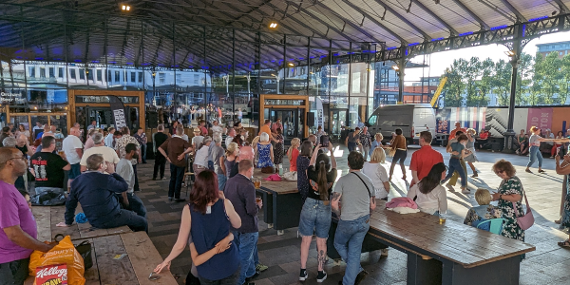People dancing under the canopy