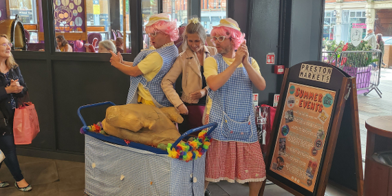 Too Cool for School performers with customer