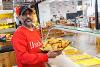 Chachas trader with tray of samosas