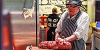 Livesey's Butchers trader prepping meat