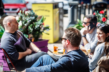 People enjoying drinks at Cherry Pie